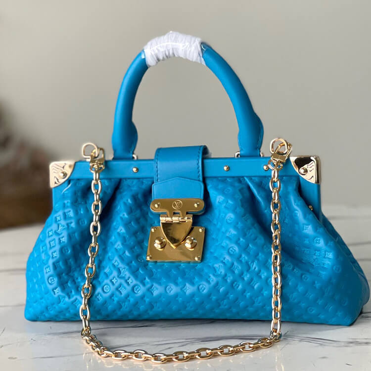 Replica-LV-Monogram-Clutch-M22325-2.jpg