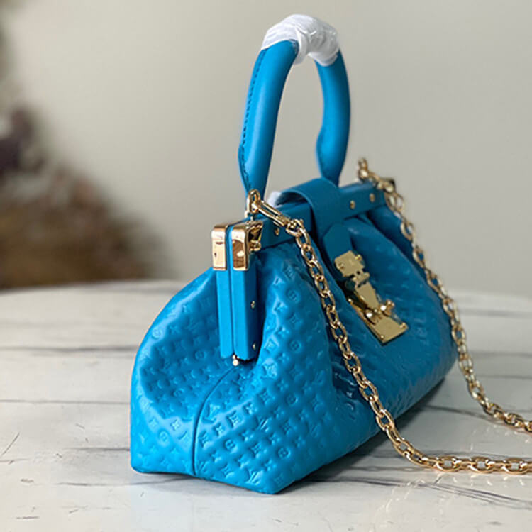 Replica-LV-Monogram-Clutch-M22325-3.jpg